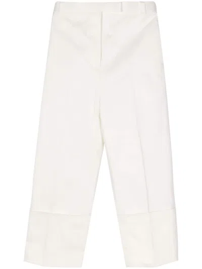 Thom Browne Pressed Crease Tapered Trousers In White