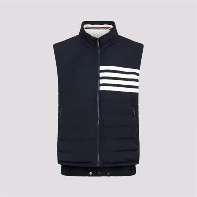 THOM BROWNE QUILTED PADDED VEST WITH HIGH COLLAR AND STRIPED DETAIL