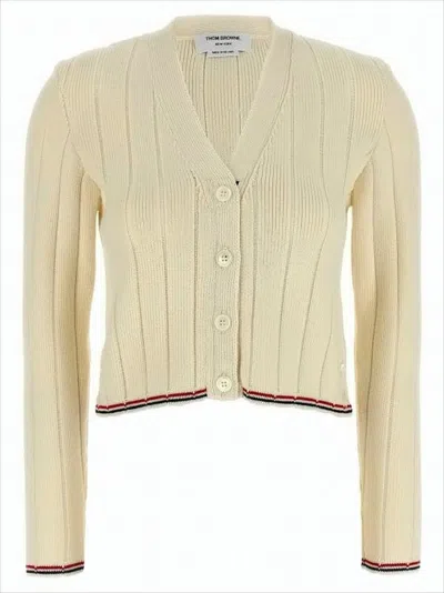 THOM BROWNE RIBBED KNIT CARDIGAN WITH CROPPED SILHOUETTE AND ICONIC STRIPE ACCENTS