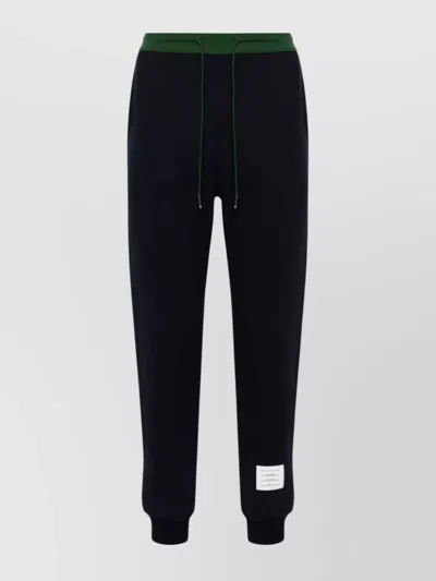 Thom Browne Ribbed Waistband Tapered Leg Trousers In Blue