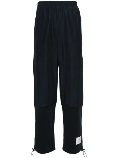Thom Browne Ripstop Tapered-leg Trousers In Navy