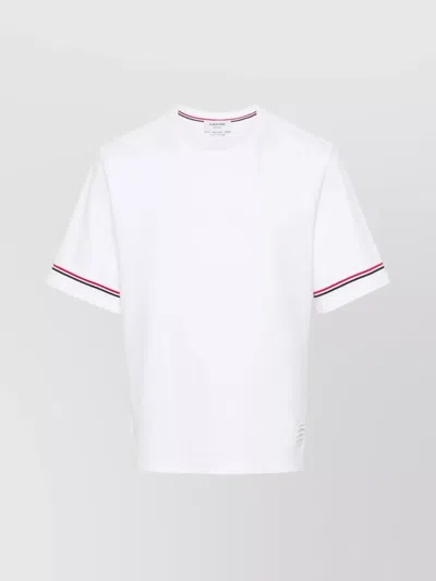 THOM BROWNE RUGBY FIT T-SHIRT WITH ASYMMETRIC HEM AND SIGNATURE DETAIL
