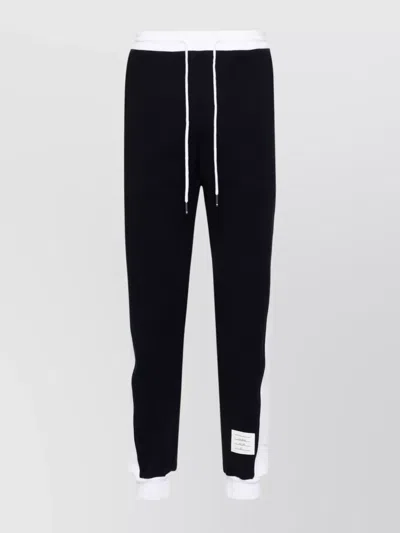 THOM BROWNE SIGNATURE STRIPE TRACK TROUSERS