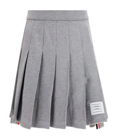 THOM BROWNE STRIPED PLEATED MINISKIRT