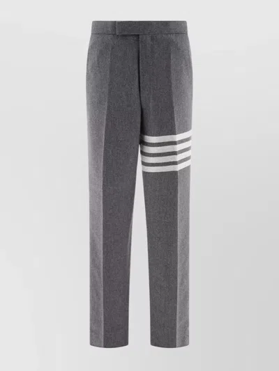THOM BROWNE STRIPED TROUSERS WITH PLEATS AND POCKETS