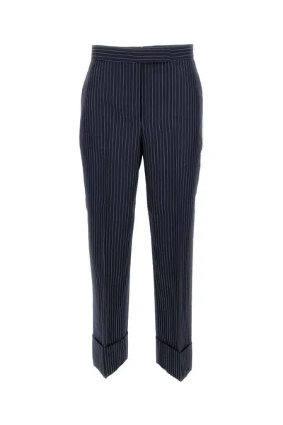 THOM BROWNE TAILORED PINSTRIPE TROUSERS WITH BACK STRAP