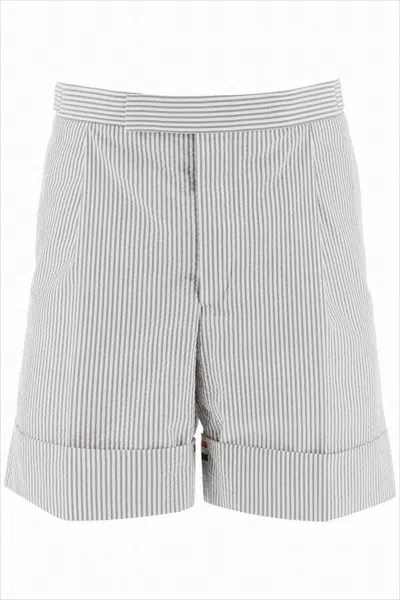 THOM BROWNE TAILORED WHITE SHORTS WITH SUBTLE PINSTRIPE AND TRICOLOR DETAIL