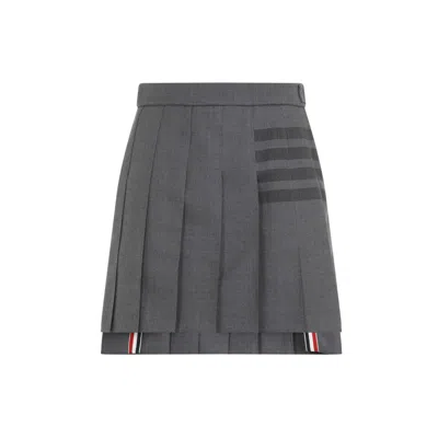 Thom Browne Thigh Length Dropped Back Pleated Skirt In Grey