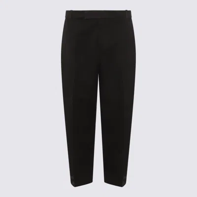 THOM BROWNE TROUSERS BLACKS AND GREYS
