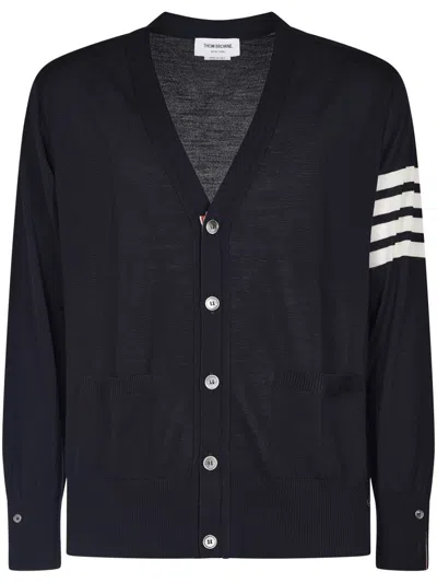 THOM BROWNE V-NECK CARDIGAN IN FINE MERINO WOOL WITH DISTINCTIVE STRIPES