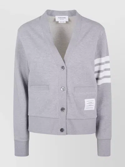 THOM BROWNE V-NECK CARDIGAN WITH POCKETS AND RIBBED CUFFS