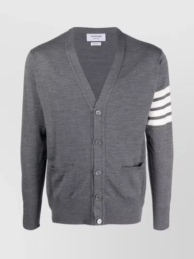 THOM BROWNE V-NECK CARDIGAN WITH STRIPES AND BUTTONED HEMS