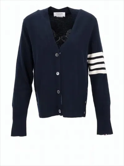 THOM BROWNE WOOL CARDIGAN WITH PLAYFUL GINGERBREAD FEATURES AND STRIPED SLEEVE