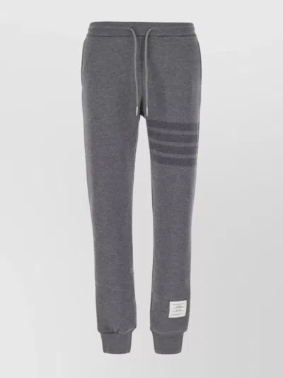 THOM BROWNE WOOL JOGGERS WITH STRIPED PRINT AND CUFFS
