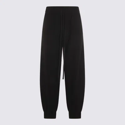 THOM KROM TROUSERS BLACKS AND GREYS