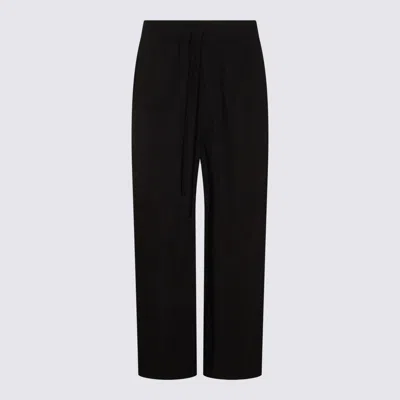 THOM KROM TROUSERS BLACKS AND GREYS