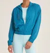 Thrive Societe Packable Bungee Windbreaker Jacket In Caribbean In Blue