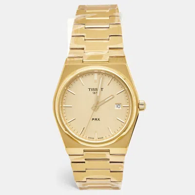 Pre-owned Tissot Prx T137.410.33.021.00 Champagne Dial Yellow Gold Pvd Coated Stainless Steel Men's Wristwatch 40 Mm