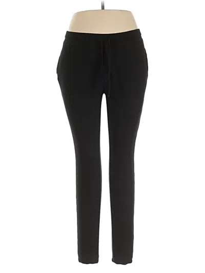 Pre-owned Tna Active Pants In Black