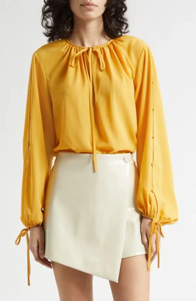 Toccin Oletta Button Long Sleeve Tie Cuff Top In Yellow