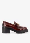 Tod's Leather Loafer With Frontal Metal Chain In Brown