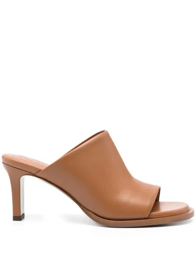 Tod's Mules In Leather In Brown