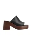 Tod's Platform Mules In Black Leather In Black