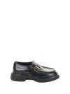 Tod's Rounded Toe Black Loafers With Buckle Detail In Black