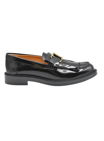 Tod's Black Flat Shoes