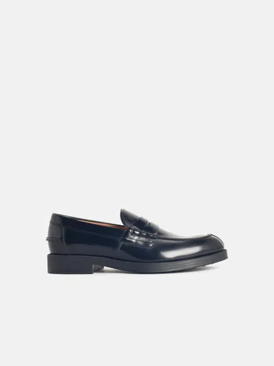 Tod's Black Leather Loafers