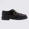 Tod's Loafer With Buckle And Fringe Detailing In Black