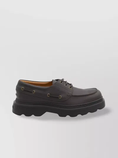 TOD'S BOAT SHOE WITH TANK TREAD SOLE