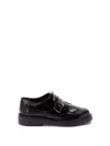 Tod's Leather Moccasins With Decorative Fringe And Buckle Strap In Black