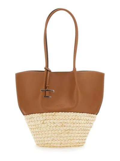 TOD'S 'BUX' BROWN SHOPPER WITH LOGO IMPRINTED ON THE FRONT AND METAL LOGO CHARM IN LEATHER AND STRAW WOMAN