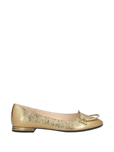 Tod's Circle Detailed Leather Ballet Flats In Gold