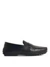 Tod's Penny Strap Round Toe Loafers In Black
