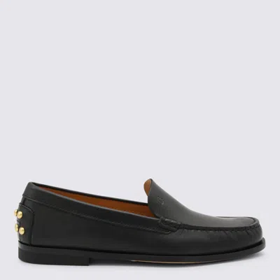 Tod's Black Loafers With Embossed Logo And Stud Details On The Back In Leather Woman