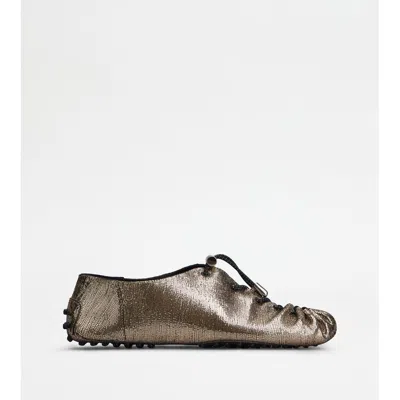 Tod's Gommino In Leather With Drawstring In Gold