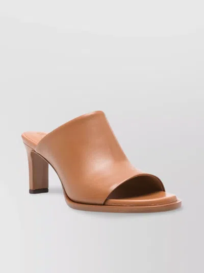 TOD'S HEEL MULES LEATHER ROUND TOE