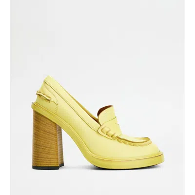 Tod's Heeled Loafers In Leather In Yellow