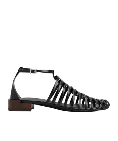 Tod's Hollowed-out Flat Sandals In Black