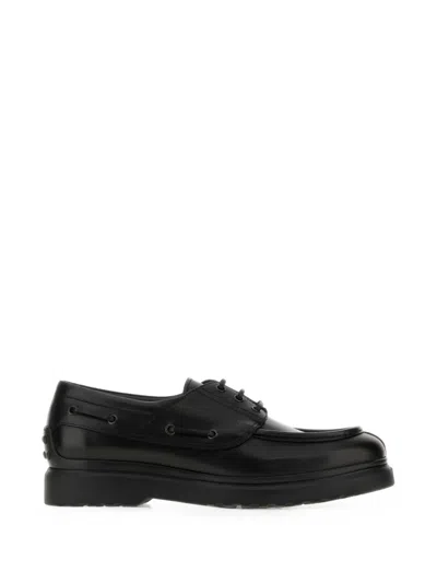 Tod's Lace-up Leather Boat Shoes In Black