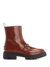Tod's Logo Plaque Round Toe Ankle Boots In Brown