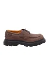 Tod's Boat Shoes With Chunky Sole And Eyelet Detailing In Brown