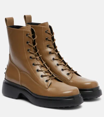 Tod's Leather Combat Boots In Brown