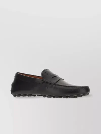 Tod's Leather Penny Strap Loafers With Pebble Sole In Black