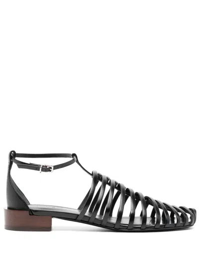 Tod's Hollowed-out Flat Sandals In Black
