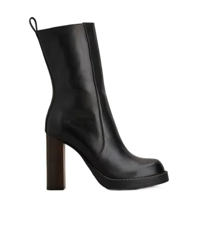 Tod's Zippered Boots In Black
