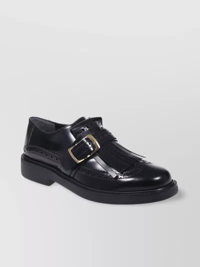 Tod's Loafer With Buckle And Fringe Detailing In Black