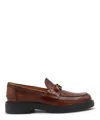 Tod's Moccasin Shoes With Decorative Emblem And Rubber Sole In Brown